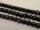 Glass bead round curvy black