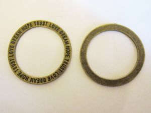 Metallidonut antique brass plated text pattern