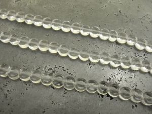 Glass bead small flat coin clear